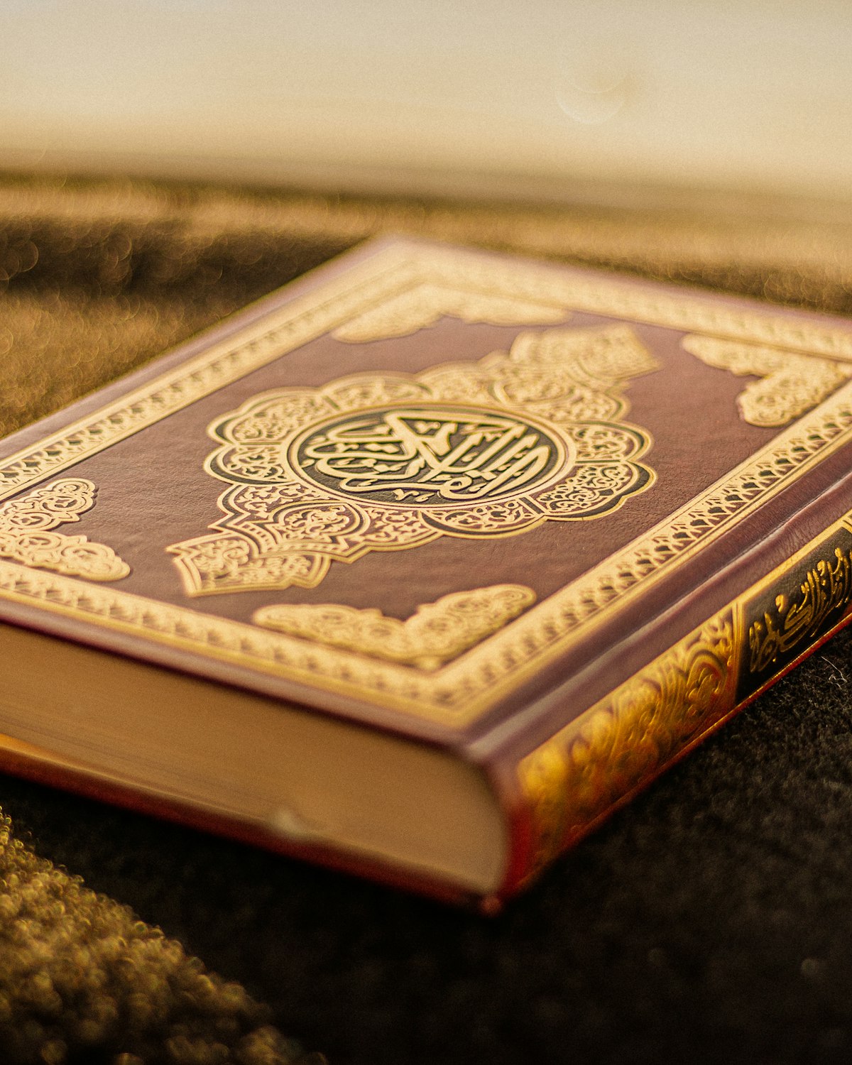 Holy Quran with gold calligraphy